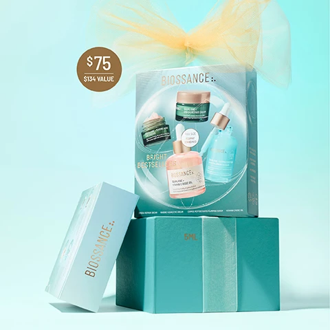 Image 2-biossance-en_US - A Biossance skincare gift set is displayed with a large teal box showcasing four products, stacked on a smaller teal box, with a light blue Biossance box leaning against it, all adorned with a gold tulle bow on a light blue background, and includes the text $75, $134 VALUE, BIOSSANCE, BRIGHT BESTSELLERS, FULL SIZE FORMAT STANDARD, SQUALANE + OMEGA REPAIR CREAM, SQUALANE + MARINE ALGAE EYE CREAM, SQUALANE + COPPER PEPTIDE RAPID PLUMPING SERUM, SQUALANE + VITAMIN C ROSE OIL, 5ML. Image 3-biossance-en_US - The image shows four Biossance skincare products with water droplets on a glittery golden ribbon: a pink dropper bottle, labeled BIOSSANCE:: SQUALANE + VITAMIN C ROSE OIL, Facial Oil to Visibly Brighten & Firm, Huile visage pour éclaircir et raffermir visiblement, with a SUGARCANE SQUALANE logo, and a separate label FULL SIZE 50ML; a small green jar with peach cream, labeled BIOSSANCE:: SQUALANE + MARINE ALGAE EYE CREAM, Eye Cream Visibly Firms & Instantly Smooths, Crème yeux raffermit visiblement et lisse instantanément, and a separate label 5ML; a green jar with white cream, labeled BIOSSANCE:: SQUALANE + OMEGA REPAIR CREAM, Face Cream Deeply Moisturizes Skin, Crème visage hydratant la peau en profondeur, and a separate label 15ML; and a blue dropper bottle, labeled BIOSSANCE:: SQUALANE + COPPER PEPTIDE RAPID PLUMPING SERUM, Instant Hydration with Hyaluronic Acid & Paracress, Une hydratation instantanée avec de lacide hyaluronique et du Cresson du Pará, with a SUGARCANE SQUALANE logo, and a separate label NEW EXCLUSIVE SIZE 15ML. Image 4-biossance-en_US - Various Biossance skincare products, including two jars and two dropper bottles, are artfully arranged on a light blue background with water droplets, accompanied by prominent text displaying product effectiveness statistics and details: MARINE ALGAE EYE CREAM 97% SHOWED IMPROVEMENT IN THE APPEARANCE OF FINE LINES AND WRINKLES AFTER 1 USE¹, VITAMIN C ROSE OIL 97% AGREE SKIN FIRMNESS AND SUPPLENESS IS IMPROVED², OMEGA REPAIR CREAM 100% SHOWED IMPROVEMENT IN SKIN HYDRATION³; visible product labels include BIOSSANCE: SQUALANE + MARINE ALGAE EYE CREAM Eye Cream Visibly Firms & Instantly Smooths Crème yeux raffermit visiblement et lisse instantanément, BIOSSANCE: SQUALANE + VITAMIN C ROSE OIL Facial Oil to Visibly Brighten & Firm Huile visage pour éclaircir et raffermir visiblement SUGARCANE SQUALANE, BIOSSANCE: SQUALANE + COPPER PEPTIDE RAPID PLUMPING SERUM Instant Hydration with Hyaluronic Acid & Paracress Une hydratation instantanée avec de lacide hyaluronique et du cresson de Para SUGARCANE SQUALANE, BIOSSANCE: SQUALANE + OMEGA REPAIR CREAM Face Cream Deeply Moisturizes Skin Crème visage hydratant la peau en profondeur; and footnotes provide context: ¹ Based on a clinical study of 33 female subjects ² Based on a 21-day consumer study of 32 women with twice daily use ³ Based on a 28-day consumer study of 31 women ⁴ Based on a clinical study of 35 women. Image 5-biossance-en_US - The image displays a four-step skincare regimen titled Bright Bestsellers Routine, featuring four products: Step 1 is BIOSSANCE. SQUALANE + MARINE ALGAE EYE CREAM, which instantly firms and lifts under eyes; Step 2 is BIOSSANCE:: SQUALANE + COPPER PEPTIDE RAPID PLUMPING SERUM, which instantly hydrates & visibly plumps; Step 3 is BIOSSANCE. SQUALANE + OMEGA REPAIR CREAM, offering rich facial hydration with weightless absorption; and Step 4 is BIOSSANCE:: SQUALANE + VITAMIN C ROSE OIL, which brightens and evens skin tone, all noted as Suitable for Sensitive Skin. Image 6-biossance-en_US - Four swatches of skincare products are spread on a light blue background: a peach-colored cream with text Marine Algae Eye Cream, a white cream with text Omega Repair Cream, a clear liquid with text Vitamin C Rose Oil, and a blue gel with text Copper Peptide Plumping Serum, along with a few clear droplets. Image 7-biossance-en_US - The image shows two angled rectangular Biossance skincare gift sets, one teal-blue and one peach-pink, against a light background, with the top banner reading ILLUMINATE YOUR GIFT LIST; the upper teal Bright Bestsellers set, described as Enhanced Glow + Hydration, is priced at $75 ($134 VALUE) and displays visible products BIOSSANCE:: SQUALANE + OMEGA REPAIR CREAM (Face Cream Deeply Moisturizes Skin), BIOSSANCE:: SQUALANE + MARINE ALGAE EYE CREAM (Eye Cream Visibly Firms & Instantly Smooths), and BIOSSANCE:: SQUALANE + COPPER PEPTIDE RAPID PLUMPING SERUM (Intensive hydration with Hyaluronic Acid), with text also stating FULL SIZE FORMAT STANDARD, DERMATOLOGIST TESTED, VEGAN, SUITABLE DURING PREGNANCY, NON-COMEDOGENIC, FOR ALL SKIN TYPES; the lower peach Uplifting Glow set, described as Visibly Firms + Hydrates, is priced at $65 ($112 VALUE) and displays visible products BIOSSANCE:: SQUALANE + MARINE ALGAE EYE CREAM (Eye Cream Visibly Firms & Instantly Smooths), BIOSSANCE:: SQUALANE + OMEGA REPAIR CREAM (Face Cream Deeply Moisturizes Skin), BIOSSANCE:: SQUALANE + VITAMIN C ROSE OIL (Facial Oil to Visibly Brighten & Firm), and BIOSSANCE:: SQUALANE + FIRM AND LIFT DUAL SERUM (Visibly Tightens + Hydrates), with text also stating FULL SIZE FORMAT STANDARD.